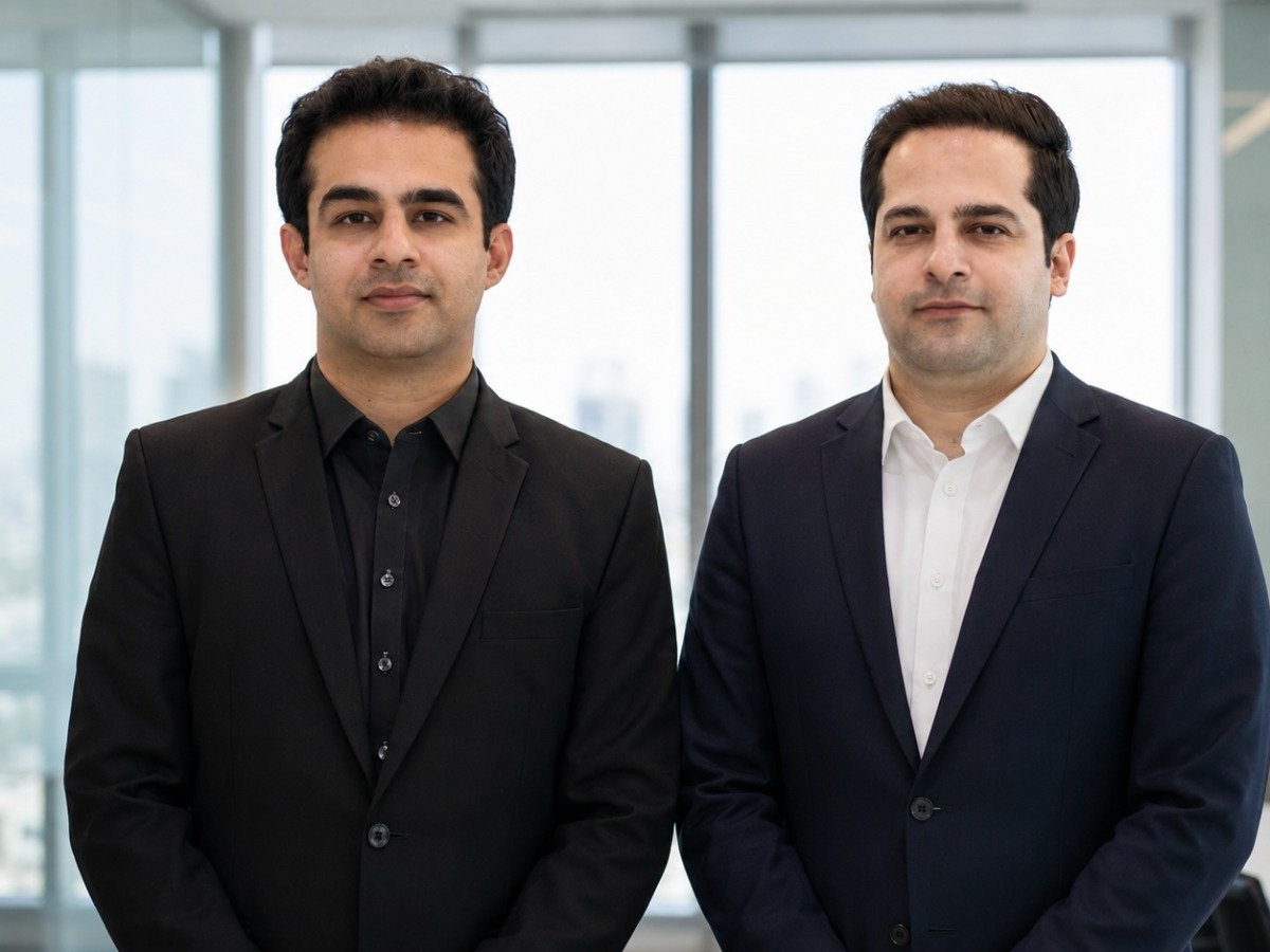 Kaiser Khan and Dr. Imran Khan, co-founders of High Yield Prep, standing together in a modern office